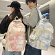 星之海減負書(shū)包男生高中生大容量雙肩包初中女生扎染大學(xué)生休閑旅行背包 藍色【帶云朵掛件】