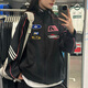 阿迪達斯 （adidas）三葉草女裝 秋季新款MOTO JKT W 賽車風立領運動寬松夾克外套 KG6676/黑色/漢玉白 XS
