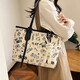 托特包大容量單肩包涂鴉包包女包手提包學(xué)生上課通勤挎包腋下包 黑色圖案【帶掛件】