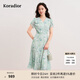 珂萊蒂爾2025夏季新款氣質(zhì)V領(lǐng)短袖連衣裙女拼接印花裙 淡藍(lán)綠色 L