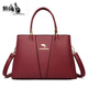 袋鼠手提包包女包2025新款中年手提包真皮包包女?huà)寢尠俅钆Ｆば笨姘?酒紅色