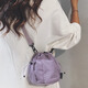 滕閣廂  包包女士斜挎包女水桶包休閑日系百搭抽繩出游尼龍斜跨手機包 紫色
