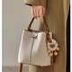 塔馳密司（touchmiss）真皮托特包女2025新款情人節水桶包手提斜挎包通勤包 米白拼咖色