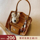 南風(fēng)Chio2nd栗秋畫(huà)廊手提包包女式2026新款原創(chuàng  )潮流單肩斜 棕色 今日拍下送小狗掛件一個(gè)