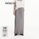 MO&Co.2024秋新品100%綿羊毛抽繩松緊腰長(cháng)款針織半身裙
