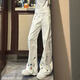 衣然呈品美式斜切微喇彎刀牛仔褲男款春夏卡通刺繡闊腿高街vibe直筒褲子男 米白色 L 【建議110-130斤】