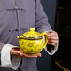 九樓閣景德鎮(zhèn)雙層帶濾網(wǎng)茶具茶壺玉瓷顏色釉中號功夫茶具陶瓷茶壺 黃金展