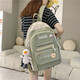 酷咖書(shū)包女雙肩包潮流大容量初中高中大學(xué)生背包韓版運動(dòng)百搭簡(jiǎn)約出行 綠色【帶鴨子掛件+隨機徽章】