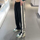阿迪達斯 （adidas）三葉草褲子女褲2025春秋新款運動(dòng)褲三條紋側開(kāi)叉寬松直筒褲長(cháng)褲 IU2519黑白 側排扣 L