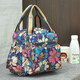 途尊（kingtrip）手提花布包女式單肩雙肩背三用包多口袋斜挎包多功能民族風(fēng)休閑包包 藍底大花