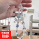 原創(chuàng  )手工串珠手機掛鏈掛繩可愛(ài)童趣手腕短款ccd相機鏈掛飾總動(dòng)員卡通 透明海鹽心掛繩