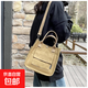 原創(chuàng  )設計立體多口袋托特帆布包手拎斜挎包簡(jiǎn)約百搭手提便當餐盒包 棕色 21*23*22CM