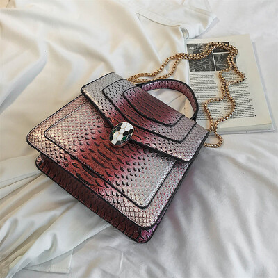 

Qiao Bani 2019 new European&American style fashion snake pattern transition color BV snake head flip cover shoulder shoulder diagonal handbag