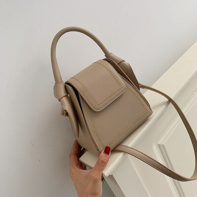 

Qiao Bani 2019 new South Korea ins fashion embroidered line hit color geometry bag hand shoulder diagonal cross-trend handbag