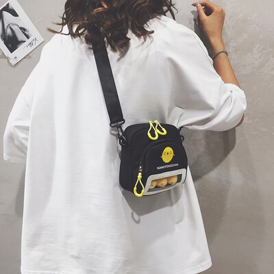 

Net red foreign small bag female 2019 new wave Korean version of the wild mini canvas bag wide shoulder strap shoulder Messenger bag