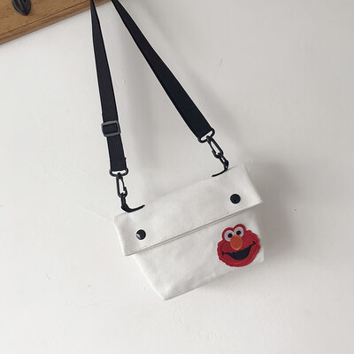 

2019 new simple&versatile fashion contrast color shoulder Messenger bag female casual cute cartoon sesame street canvas bag