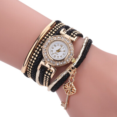 

Creative fashion ladies winding bracelet watch gold key pendant quartz watch female models explosion models