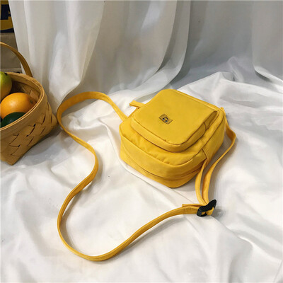 

Small bag canvas bag woman single shoulder oblique satchel student Mori hundred Han version of the ancient feeling girl ins bungee