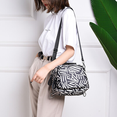 

Womens Canvas Backpack Mini Korean version of nylon Oxford cotton-wrapped womens style