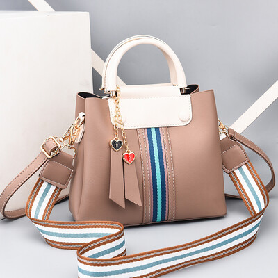 

Baggage ladies summer fashion hand-held large capacity collision color bucket bag simple texture Baitao soft slanting