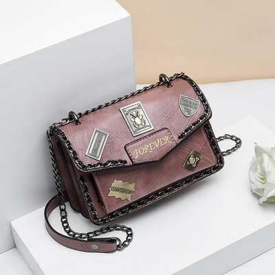 

Retro spring&summer tide woman hand-held retro badge 100 lap rivets chain single shoulder oblique satchel bag
