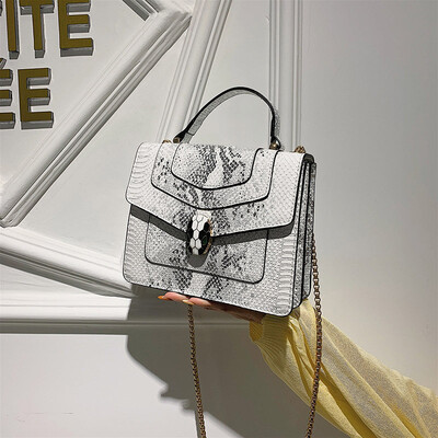 

Qiao Bani 2019 new European&American style fashion snake head BV snake pattern flip bag hand strap shoulder diagonal trend handbags