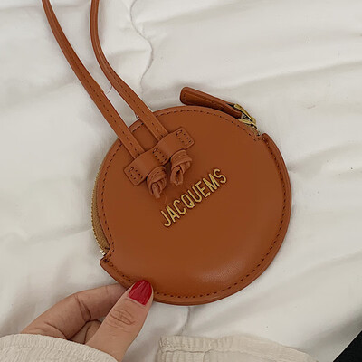 

On the new womens bag 2019 new tide Korean fashion shoulder small round bag foreign girl Joker Messenger bag