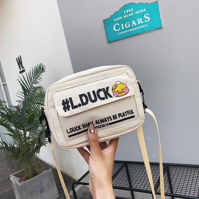

Ins super fire on the new canvas casual slung packet female 2019 new Korean version of the wild net red shoulder small square bag