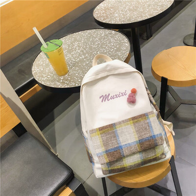 

Schoolbag female college students backpack ins wind bf Korean version of high school ancient feeling girl Mori simple canvas backp