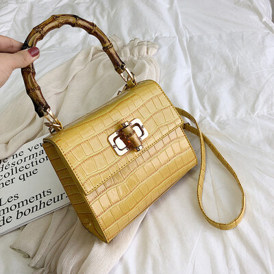 

Qiao Bani 2019 new European&American style fashion solid color crocodile pattern bamboo bag hand bag shoulder diagonal cross trend handbags