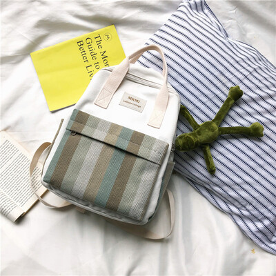 

Canvas schoolbag Korean version ins Fenghyuya junior high school students backpack female shoulder bag Japanese department is love