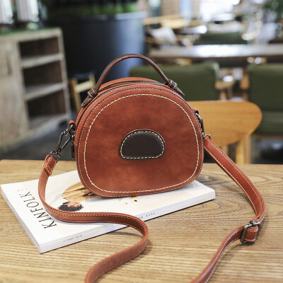 

Summer new small bag female 2019 new small round bag leather handbag fashion wild shoulder slung handbag