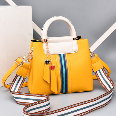 

Baggage ladies summer fashion hand-held large capacity collision color bucket bag simple texture Baitao soft slanting