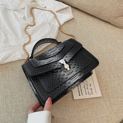 

Qiao Bani 2019 new European&American style fashion snake pattern transition color BV snake head flip cover shoulder shoulder diagonal handbag