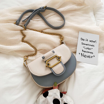 

Qiao Bani 2019 new Korean fashion Dongdaemun hit color elliptical saddle bag slant diagonal cross-flow PU handbag