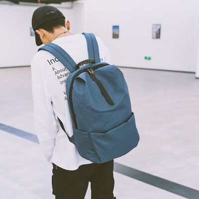 

Schoolbag mens Japanese fashion casual couple backpack large capacity multi-functional personality travel womens backpack tide