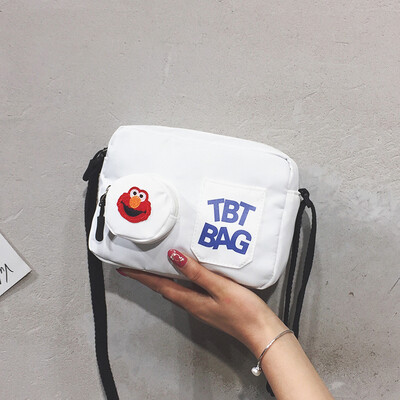 

Ins super fire canvas small bag female 2019 on the new wild Harajuku student cartoon Messenger bag net red di di package