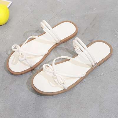 Two flat-soled sandals for girls with open toes&flat heels&cross-straps for Roman sandals Chic Hanfeng Student Shoes