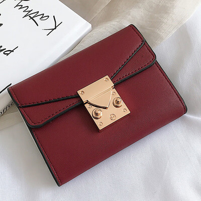 

Hong Kong fashion small wallet female short personality retro folding wallet multi-card buckle change card bag