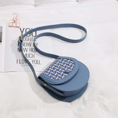 

French minority slung Joker woven womens bag 2019 new fashion Korean version of single shoulder simple saddle bag