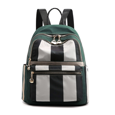 

Double shoulder bag female Korean version tide Oxford small backpack lady travel all kinds of fashion canvas schoolbag