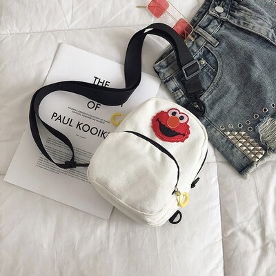 

Cute cartoon simple wild shoulder Messenger bag female 2019 new casual fashion ugly cute Sesame Street canvas bag