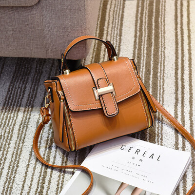 

On the new small bag female contracted Korean Messenger bag retro art shoulder portable summer bucket bag
