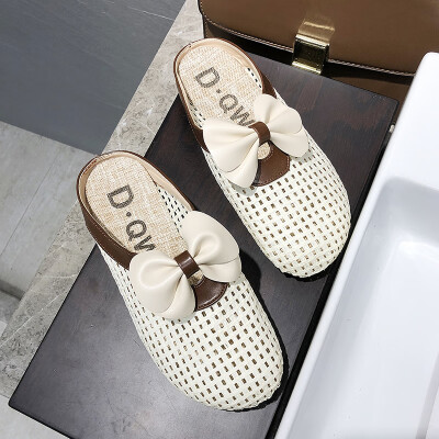 

Baotou half slippers women wear 2019 new summer hollow cute bow flat heel slippers tide