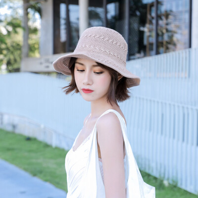 

The Korean version of Xia Bais fishing cap is worn with a bow-tie straw hat
