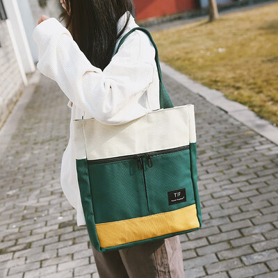 

Ins super fire bag female 2019 new wave Korean version of the student canvas bag female shoulder bag hit color portable shopping bag