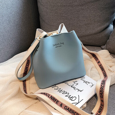 

Textured handbags new Korean fashion color bucket bag wild wide shoulder strap shoulder slung bulk bag