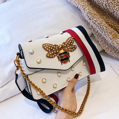 

Chobani 2019 new hot Korean ins Yang Mi star with the same paragraph pearl bee shoulder diagonal tide handbag