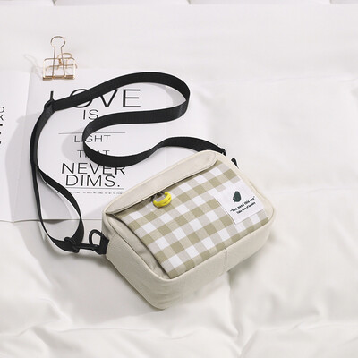

Chic literary girl slung small bag female 2019 plaid canvas bag Japanese foreign gas wild shoulder student bag