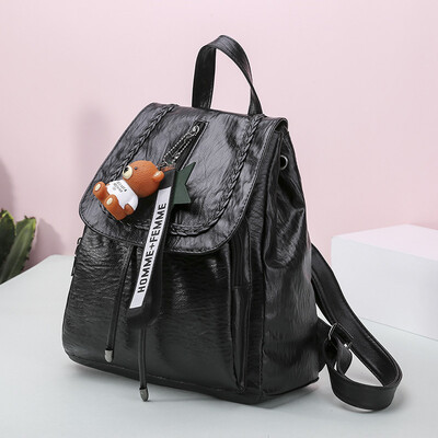 

Backpack womens 2018 new weaving Korean version of the tide pu soft leather simple leisure college wind